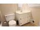 Clean bathroom with a classic white toilet and vanity at 2886 Thornbriar Rd, Atlanta, GA 30340