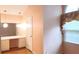 Vanity in bedroom featuring a large arched window and hardwood floors at 2886 Thornbriar Rd, Atlanta, GA 30340