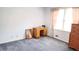 Bedroom with blue carpet, desk with drawers, window with curtains and a dresser at 2886 Thornbriar Rd, Atlanta, GA 30340