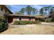 Well-kept single-story home with a covered carport and brick facade at 2886 Thornbriar Rd, Atlanta, GA 30340