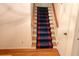 Carpeted staircase leading to the upper level of the home at 2886 Thornbriar Rd, Atlanta, GA 30340