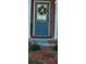Welcoming front door with a wreath and visible house numbers at 3182 Mill Springs Cir, Buford, GA 30519