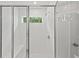 Modern shower with glass doors, bench, and tiled walls, providing a spa-like experience at 400 Beacon Way, Villa Rica, GA 30180