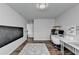 Bright, open office featuring desk, storage, and chalkboard wall on hardwood floors at 5215 Wheeler Run Dr, Auburn, GA 30011