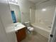 Bathroom with a tub/shower combination and single sink vanity at 6941 Rogers Pt, Lithonia, GA 30058