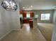 Eat in kitchen featuring stainless steel appliances and oak cabinets with a bar area at 6941 Rogers Pt, Lithonia, GA 30058