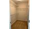 Spacious walk-in closet with wire shelving at 6941 Rogers Pt, Lithonia, GA 30058