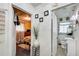 Hallway view with doorways leading to a bedroom and a bathroom, neutral wall color and decor at 2293 Ewing Sw St, Atlanta, GA 30331