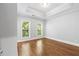 Bright bedroom with hardwood floors, tray ceiling, and lots of natural light at 2548 Crescent Park Ct # 7, Atlanta, GA 30339