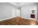 Spacious bedroom featuring hardwood floors with an ensuite bath at 2548 Crescent Park Ct # 7, Atlanta, GA 30339