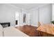 Bright room with pristine hardwood floors showcasing a bathroom through an open door at 2548 Crescent Park Ct # 7, Atlanta, GA 30339
