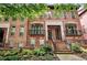 Charming brick townhome with multiple stories, a landscaped front yard, and a welcoming front entrance at 2548 Crescent Park Ct # 7, Atlanta, GA 30339