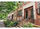 Street view of brick townhomes with well-maintained landscaping and charming architectural details at 2548 Crescent Park Ct # 7, Atlanta, GA 30339