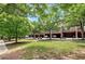 Beautiful townhome community featuring lush landscaping and convenient parking spaces for residents and guests at 2548 Crescent Park Ct # 7, Atlanta, GA 30339