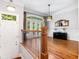 Hardwood foyer showcasing large windows and an elegant railing system at 2548 Crescent Park Ct # 7, Atlanta, GA 30339