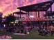 Community enjoying an outdoor movie at The Battery Atlanta in a relaxed setting at 2548 Crescent Park Ct # 7, Atlanta, GA 30339