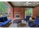 Relaxing outdoor seating area with a cozy fireplace and comfortable furniture for year-round enjoyment at 2548 Crescent Park Ct # 7, Atlanta, GA 30339