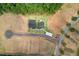 New construction home with backyard fire pit area and landscaping at 410 Beacon Way Way, Villa Rica, GA 30180