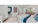 Spacious main bedroom featuring a walk-in closet and a view of the ensuite bathroom at 410 Beacon Way Way, Villa Rica, GA 30180