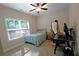 Cozy bedroom with a single bed, window, and a desk with computers at 8145 Lakeview Pkwy, Villa Rica, GA 30180