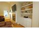Close up of living room fireplace with stylish mantel and built-in shelves at 8145 Lakeview Pkwy, Villa Rica, GA 30180