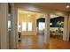Open foyer with hardwood floors and dining room, perfect for entertaining guests at 8145 Lakeview Pkwy, Villa Rica, GA 30180