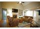 Cozy living room with fireplace, built-in shelving, and comfortable seating at 8145 Lakeview Pkwy, Villa Rica, GA 30180