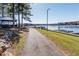 Paved road leading to community docks on a sunny day at 8145 Lakeview Pkwy, Villa Rica, GA 30180
