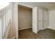Hallway closet and additional doors, with tile flooring at 8607 Wood Springs Ct, Douglasville, GA 30135