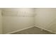 Walk-in closet with wire shelving and ample storage space at 8607 Wood Springs Ct, Douglasville, GA 30135