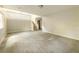 Spacious living room with tile floors, staircase and natural light at 8607 Wood Springs Ct, Douglasville, GA 30135