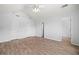 Spacious bedroom with vaulted ceiling, ceiling fan, wood-look flooring and multiple doors at 503 Fable Ln, Canton, GA 30114