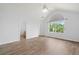 Large bedroom featuring an arched window, and an ensuite bathroom at 503 Fable Ln, Canton, GA 30114