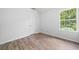 A well-lit bedroom with a view to the exterior at 503 Fable Ln, Canton, GA 30114