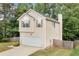 Charming two-story home featuring an attached garage and well-maintained front yard at 503 Fable Ln, Canton, GA 30114