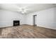 Cozy living room features a classic fireplace and durable flooring, offering a comfortable space at 503 Fable Ln, Canton, GA 30114