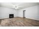 Spacious living room featuring modern flooring, a fireplace, and natural light at 503 Fable Ln, Canton, GA 30114