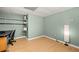 Office features wood-look floors, modern lighting, and a built-in shelving at 503 Fable Ln, Canton, GA 30114