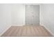 A practical basement space is finished with carpet and equipped with a sturdy double door at 5142 Golfbrook Ct, Stone Mountain, GA 30088