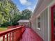 The property boasts a spacious deck, perfect for outdoor living and entertaining at 5142 Golfbrook Ct, Stone Mountain, GA 30088