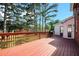Back deck with backyard views and a grill at 5633 Southland Dr, Stone Mountain, GA 30087