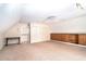 Spacious bonus room featuring built-in shelving and cabinets at 5633 Southland Dr, Stone Mountain, GA 30087