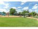A charming community playground with slides, swings, and a gazebo, perfect for Gathering fun in a green and inviting space at 5633 Southland Dr, Stone Mountain, GA 30087