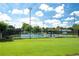 Well-maintained community tennis courts surrounded by lush greenery, providing an active and social recreational space at 5633 Southland Dr, Stone Mountain, GA 30087