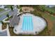 Aerial view of the community pool, with ample seating and covered lounge area at 7570 Rambling Vale, Cumming, GA 30028