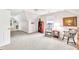 Spacious bedroom with seating, carpeting, and large windows for ample natural light at 2101 Emerald Dr, Loganville, GA 30052