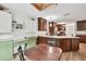 Charming kitchen featuring wood cabinets, a central island, and adjacent breakfast nook at 2101 Emerald Dr, Loganville, GA 30052
