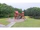 Fun playground with swings and slides perfect for to enjoy outdoor playtime at 2101 Emerald Dr, Loganville, GA 30052