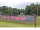 Well-maintained community tennis court for recreational enjoyment and active living at 2101 Emerald Dr, Loganville, GA 30052