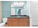 Bright bathroom features modern vanity with granite countertop and updated fixtures at 3300 Windy Ridge Se Pkwy # 1107, Atlanta, GA 30339
